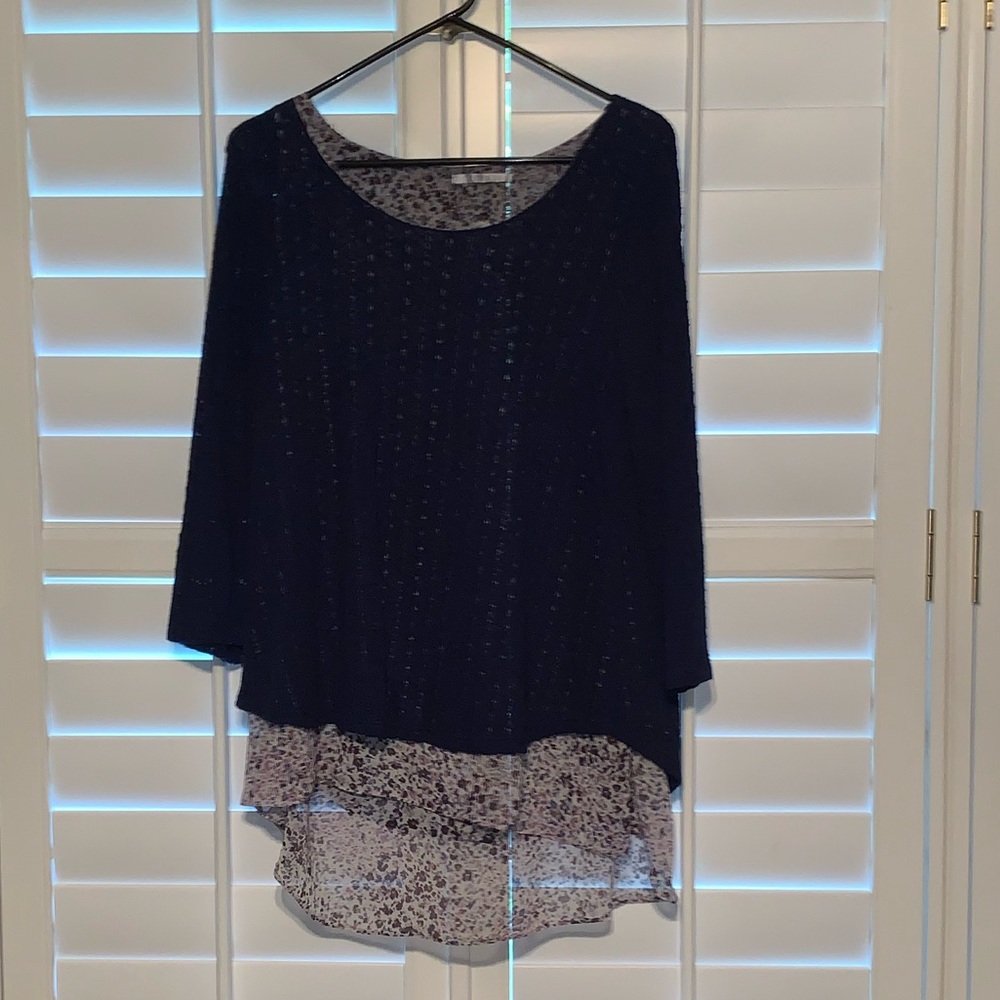 Medium high low light weight sweater shirt.